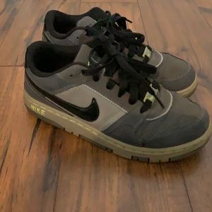 Lighted worn used Nike sneaker.
